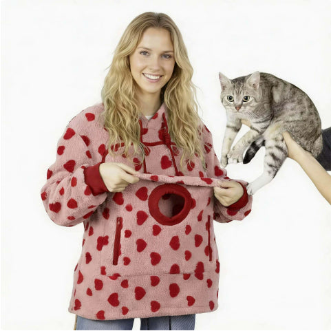 Showing the round head opening of the pouch on a red heart Pawdie hoodie